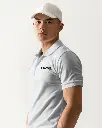 asian-male-model-wearing-a-white-polo-t-shirt-mockup-and-white-cap-0286.webp